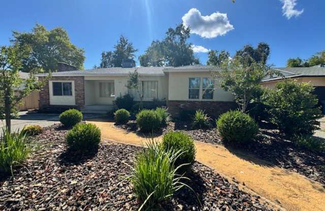 Charming Updated 4-Bedroom Home in the Garden Tract – Hardwood Floors, Central Air, 2-Car Garage + Storage! photos photos