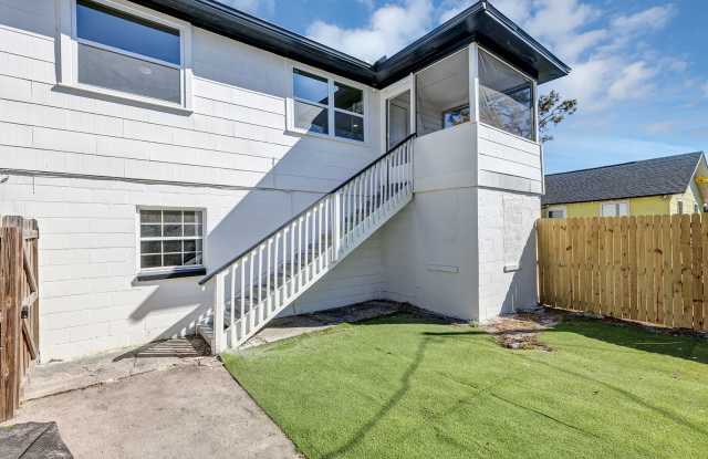 Bright  Updated 2BR Top Unit Duplex | White Kitchen  Stainless Appliances in Saint Petersburg photos photos