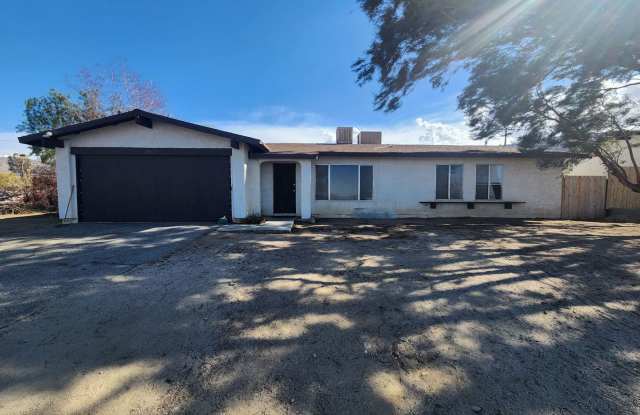**Move In Special $100 Off 1st Month's Rent** Home In Hansen Track Neighborhood - 74571 Sunrise Drive, Twentynine Palms, CA 92277