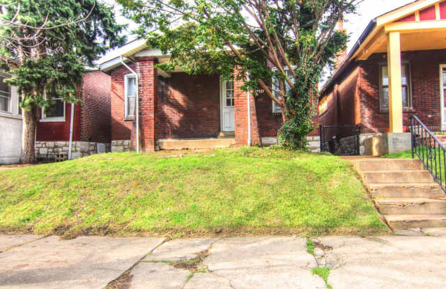 This 2 bedroom 1 bath home has been completely refinished with brilliant hardwood floors throughout! photos photos