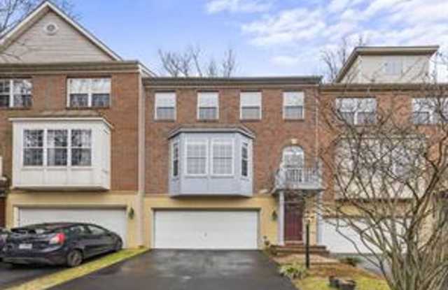 This stunning 3 bed. 3.5 bath brick townhome offers over 2,400 sq feet of modern living space. photos photos