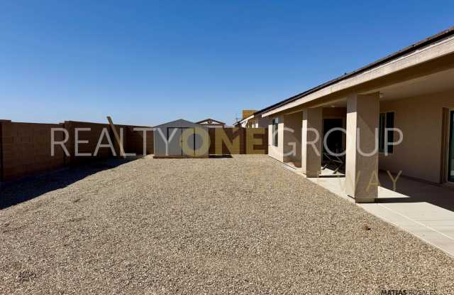 Enjoy those Arizona Sunset in this Three Bedroom Two Bath Home full of upgrades !! Gallery 3
