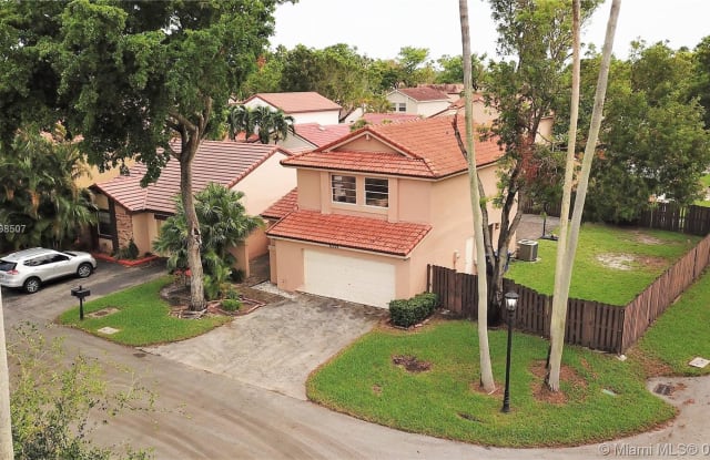6332 NW 180th Ter - 6332 Northwest 180th Terrace, Country Club, FL 33015