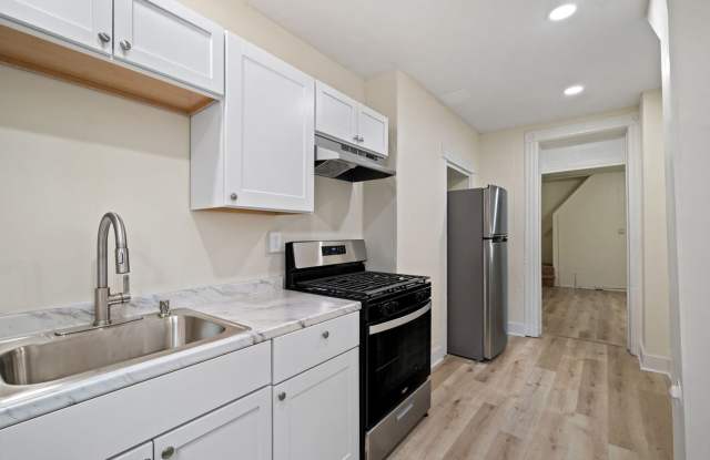 Newly Renovated 2 Bedroom Unit + Bonus Room In The South Side. Available Immediately. photos photos