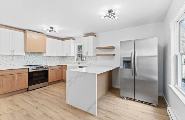 Elegant, Fully Renovated Atco Gem with Designer Kitchen  Expanded Living Space photos photos