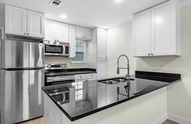 Crown Molding  Granite Kitchens********* Renovated 2 Bedroom 1.5 Bath********* Beautiful Townhome Living photos photos