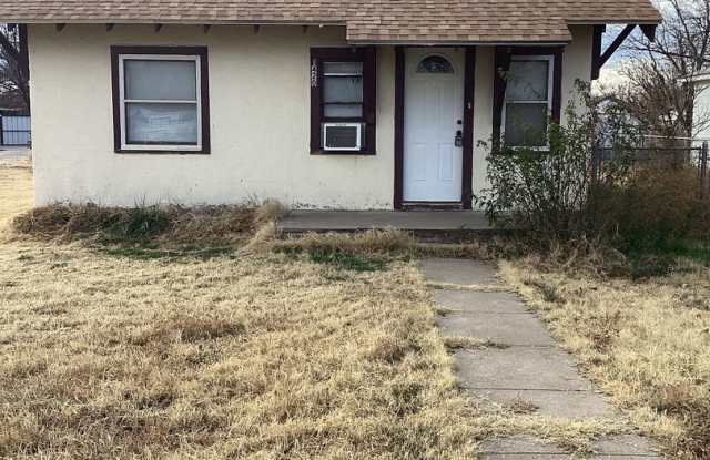 Freshly painted rooms in cute 2 bedroom home on quiet street! Pets welcome! photos photos