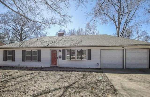 {5611} Updated OP Ranch + Two Car Garage + Fenced Yard and Stamped Concrete Patio Perfect for Spring BBQs - 5611 West 101st Street, Overland Park, KS 66207