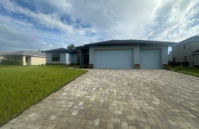 Brand New Construction Waterfront Home in NW Cape Featuring A Fenced Pool,  More! photos photos