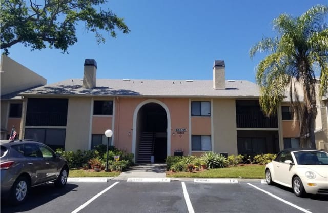 13305 WHISPERING PALMS PLACE SW - 13305 Whispering Palms Place Southwest, Largo, FL 33774