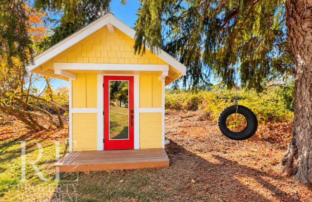 Whimsical Craftsman with Wraparound Porch, Bonus Room & Liberty Bay Peek Views Gallery 4