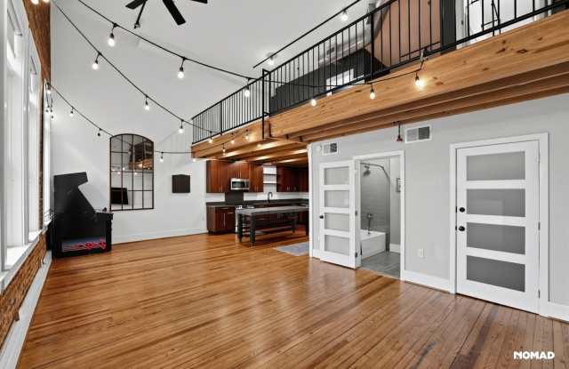 Huge Lofted Condo Overlooking Main Street Gallery 3