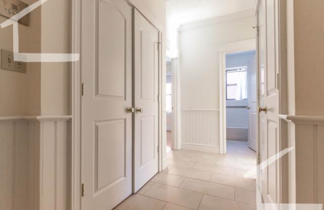 Newly renovated 2nd floor 1 bed unit right next to the Green Line! photos photos