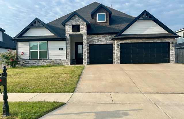 Spacious 4-Bedroom Home with 3-Car Garage photos photos