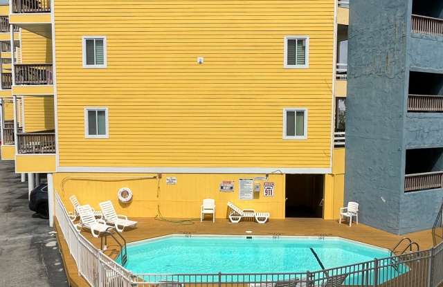 Monthly rental offered on this furnished remodeled condo in Carolina Beach! - 302 Canal Drive, Carolina Beach, NC 28428