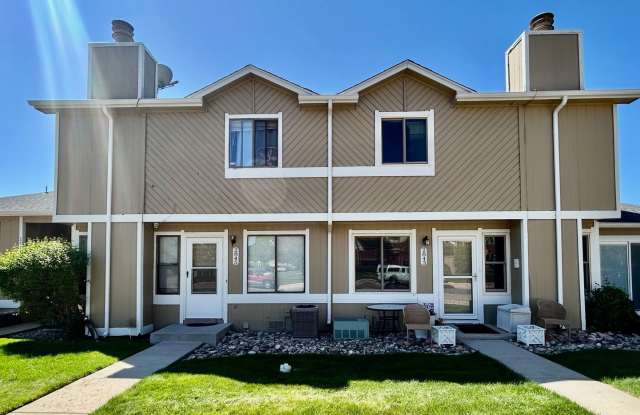Updated Two Bed Townhome Nestled in the Hearthwood Condominiums! photos photos