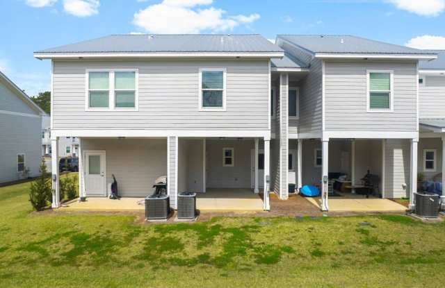 Affordable Coastal Living with Peaceful Wooded Views! Gallery 3