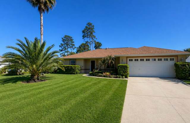Discover this well-located 3-bedroom, 2-bath home in Palm Coast! photos photos