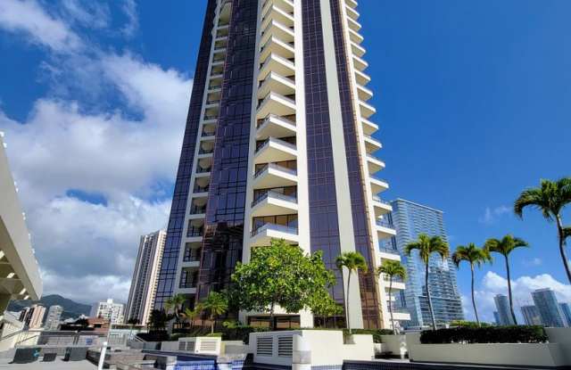 Enjoy spectacular ocean, mountain and city views from this bright 2 bedroom, 2 bath, high floor condo known as the Imperial Plaza in Kakaako. photos photos