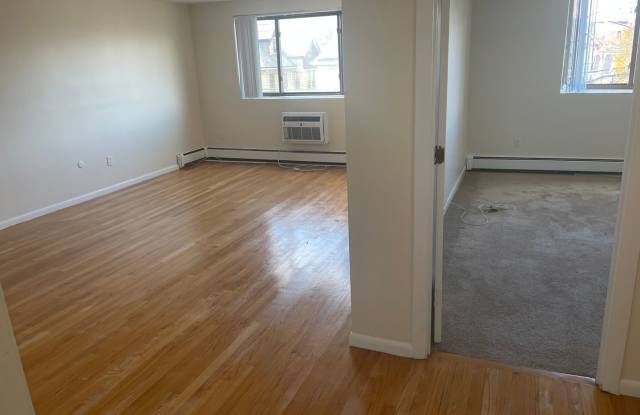 No Fee Massive 2 bed with New floors, kitchen and paint, AC VERY SUNNY!!  PARKING INCLUDED photos photos