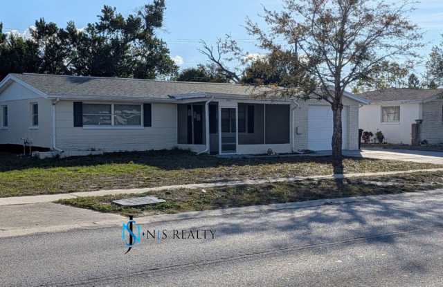 Check out this 3/1.5/1 1113 Sq. Ft. with UPDATED bathrooms and kitchen with GRANITE, LARGE backyard with a shed!!! photos photos