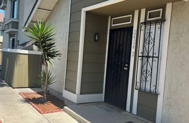 Beautiful 2 Bedroom/1 Bath Floor Level Remodeled Townhome with Two Patios! $2,575.00 photos photos