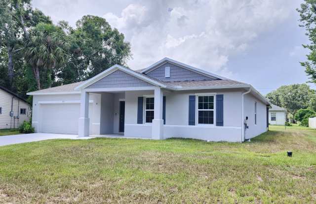 Spacious 4 BR 2 BA 2 CG rental in central Palm Bay photos photos