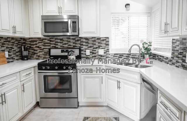 6910 Woodman Ave - 6910 Woodman Avenue, Los Angeles, CA 91405