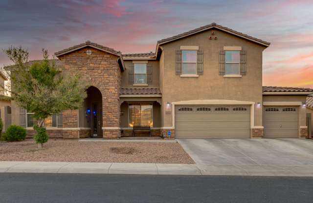 GORGEOUS HOME IN SURPRISE FARMS! 5 BED, 3 BATH W SPARKLING POOL AND 4 CAR GARAGE! photos photos