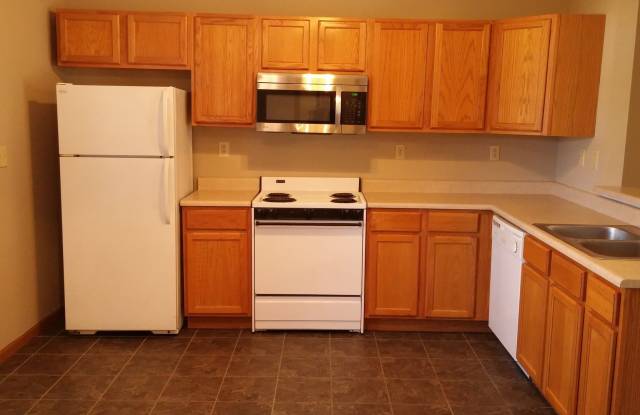 Spacious 2BD 2 BA duplex with 2 Car attached garage. Just a few steps away from everything you need! photos photos