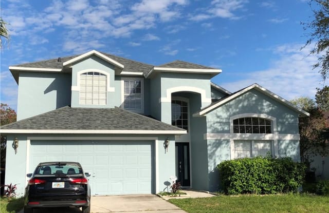 7928 GOLDEN POND CIRCLE - 7928 Golden Pond Circle, Four Corners, FL 34747
