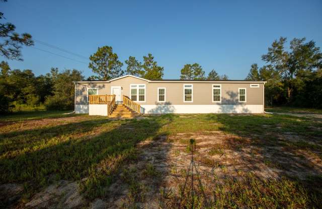 Enjoy 2.89 Acres with lots a room to roam! Gallery 1
