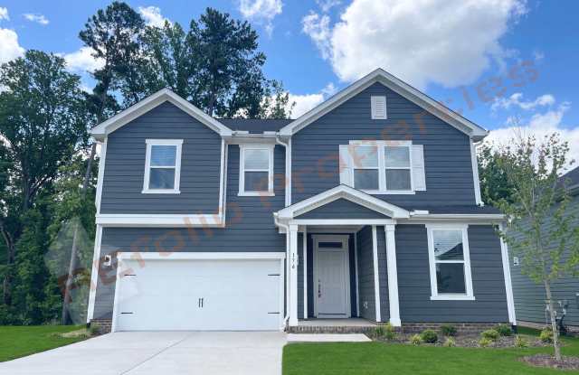 Sign and execute a lease on or before September 1, 2026, and receive a $2,400 leasing incentive! Gorgeous 4 Bedroom, 3 Bath Home with a 2-Car Garage & Guest Suite on the Main Level in Harpers Landing, Garner – Available Sept 1st! photos photos