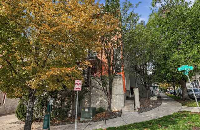 Great location with 3 sides of windows and HUGE rooftop! Gallery 4