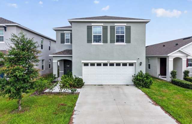 Available Now! 4BR Home in Avalon Park with Fenced Yard & Resort-Style Amenities photos photos