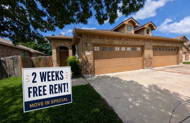 2 Weeks Free Rent / 3/2/2 Duplex off HWY 46 / Fridge / Interior Washer & Dryer Connections / Fenced in Backyard / CISD photos photos