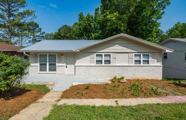 Spacious & Renovated 3-Bedroom Home with Finished Basement & Large Deck! photos photos