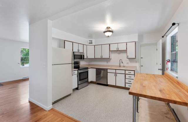 Student Friendly! Spacious 5 Bedroom, 2 Bath Home with Finished Basement and Attached Garage photos photos