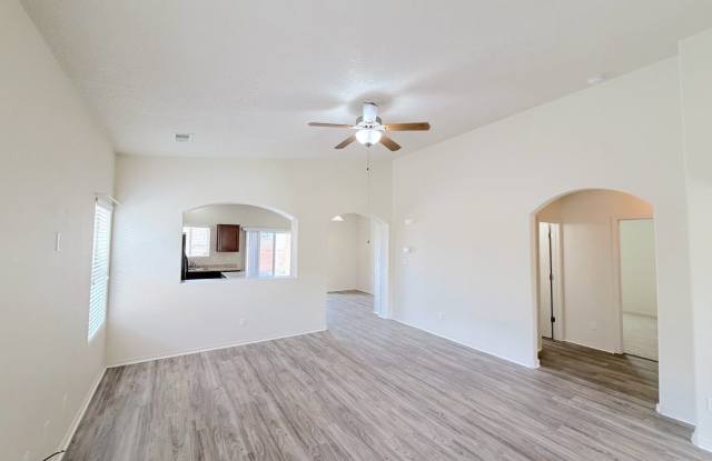 Beautiful 3 bed 2 bath in SW Albuquerque! Spacious layout. New Flooring! 2 Car Garage. Near 98th and Gibson. photos photos