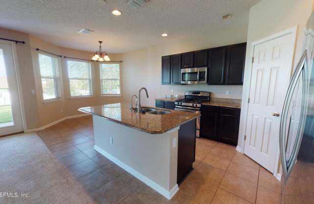 168 WOODLAND GREENS Drive - 168 Woodland Greens Drive, Nocatee, FL 32081