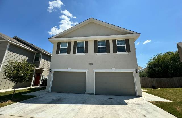 Move Fast! Gated Townhome Near Lackland AFB with Private Yard & EV-Ready Garage photos photos