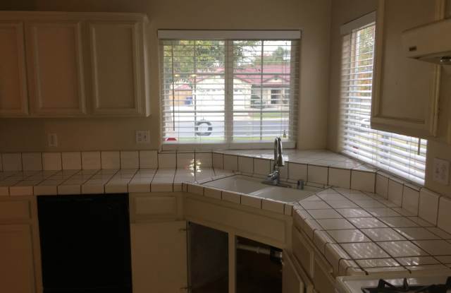 3 Bedroom Home with Attached 2-Car Garage, Fireplace & Gardening Included Gallery 3