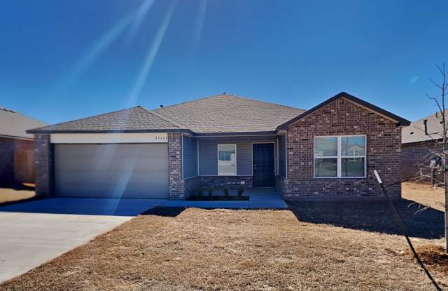 Welcome to spacious 4-bedroom, 2-bathroom home in Harrah, OK! photos photos