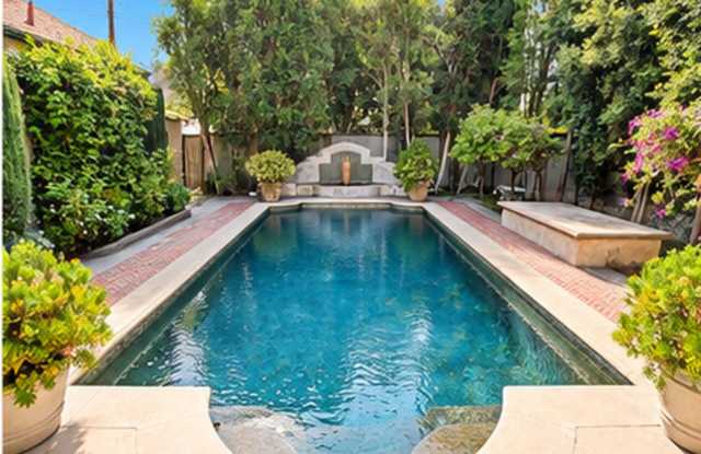 English-Tudor 3brm, 2 1/2 bath front residence  AND, detached 1brm unit with, pool & spa Gallery 1