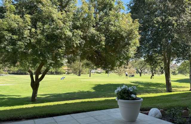 Enjoy stunning panoramic views of the golf course from this beautifully upgraded, single-level condo in the desirable “West Nine” community photos photos