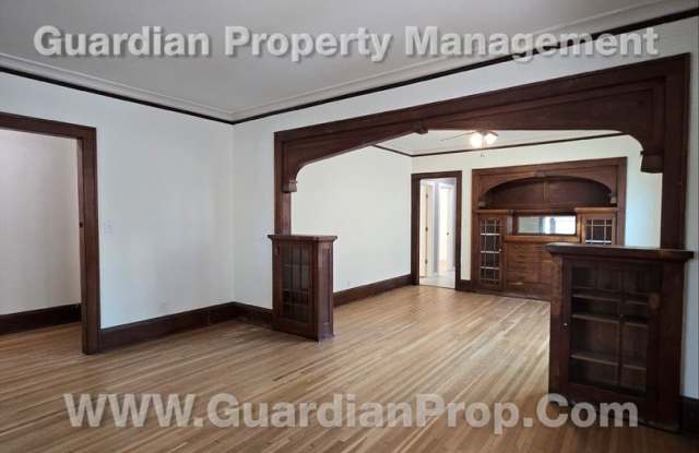 Large main floor duplex unit, Updated Kitchen & Bath, Full Dining Room w/Built-ins + Sunroom, garage stall photos photos