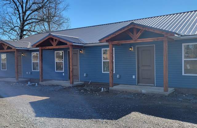 2 Bedroom/2 Bathroom Triplex Unit • Southside Gallery 1