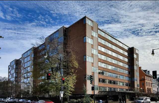 Bright fifth-floor one-bedroom in the heart of Dupont Circle with floor-to-ceiling windows and an unbeatable location. photos photos