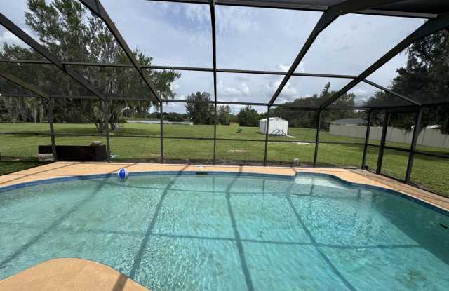 Beautiful Lakefront Home on 2+ Acres with Private Pool – Optional Service Bundle Available - 20855 Lake Patience Road, Pasco County, FL 34638