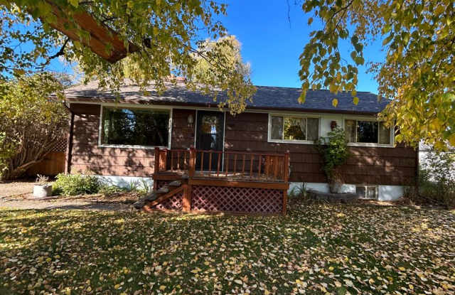 Charming 3 Bedroom Home with Large Heated Shop! photos photos